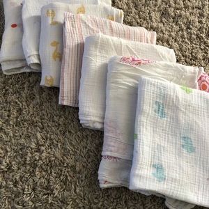 Seven Aden and anais Muslin swaddle blankets!